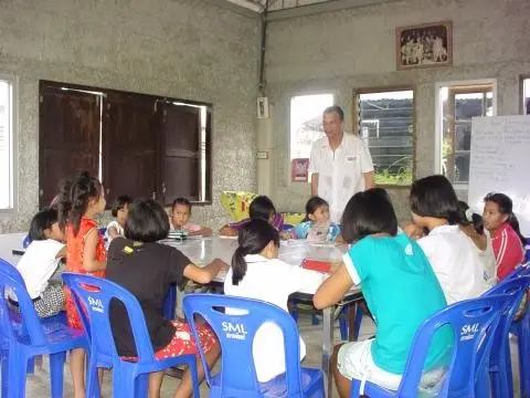 Children of underprivileged families in a classroom